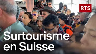 Surtourisme : la Suisse est-elle devenue victime de son succès ? | RTS