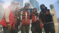 Bears fans Bear Down and fire up next to Caleb Williams ice sculpture ahead of next playoff game