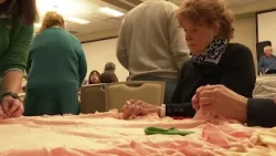Volunteers honor Dr. Martin Luther King Jr. by making blankets for families in need