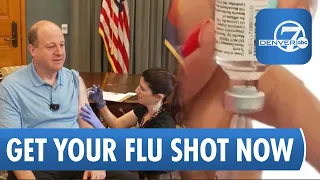Gov. Polis urges flu shots