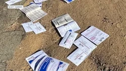 Mail-in ballots strewn along North County road
