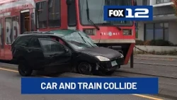 1 taken to hospital after car, MAX train collide in N Portland