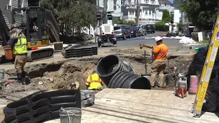 Crews clean up storm damage after pipe burst and road caves in Naugatuck