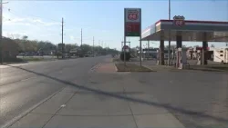 Woman charged in gas station double shooting
