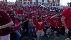 Fans storm the field after UC's homecoming win over Texas Tech