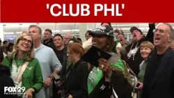 Eagles fans enjoy surprise party before flight to London