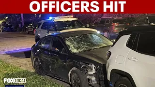 Philadelphia police search for driver who hit 2 officers