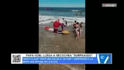 PAPÁ NOEL LLEGA A NECOCHEA "SURFEANDO"