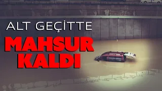 Su basan alt geçitte bir araç mahsur kaldı