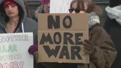 Suburban protesters rally against joint US and Israeli military strikes on Iran