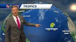 Warmer, higher humidity, isolated showers, and the first tropical potential of the season