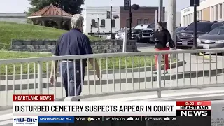 Three men charged with disturbing graves at historic cemeteries return to court