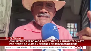 Comunitarios de Bonao protestan en la autopista Duarte por retiro de muros y demanda de servicios bá