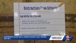 Gov. Laura Kelly signs bill restricting cell phone use in Kansas schools