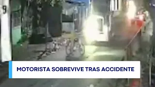 Motorcyclist survives after being struck by a semi-truck