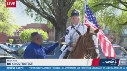 Revolutionary War re-enactor and his trusty steed came out for the No Kings Protests