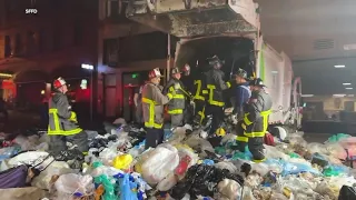 San Francisco firefighters rescue dumpster diver stuck in garbage truck in Tenderloin