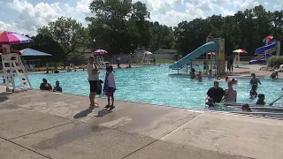 Families cool off at a free pool party in Kingston