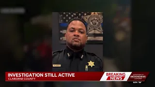 Mourners gather to remember Deputy Bailey, on day arrests were made