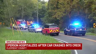 1 person hospitalized after car crashes into creek
