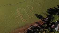 Help and SOS signs appear in drought stricken Switzerland lakebed