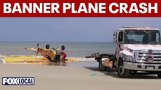 Banner plane crash lands on Smyrna Beach in Florida