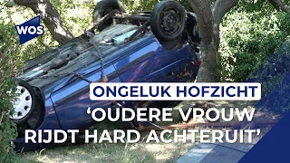 Oudere vrouw rijdt hard achteruit het water in