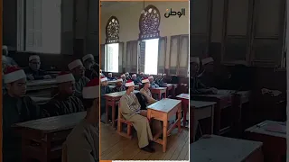 Students at Fouad I Al-Azhari Institute in Asyut begin their first regular school day in official...