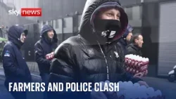 Police sprayed with manure as farmers blockade EU HQ