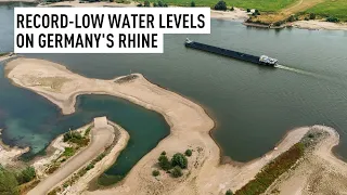 Exposed riverbanks and shipping bottlenecks as Rhine hits record lows