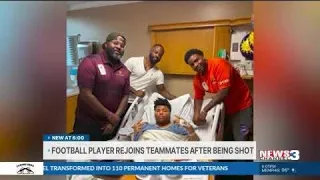 High school football player shot at store surprises his teammates