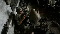 Pakistan'da mezar taşlarındaki portreler sevdiklerin anısını yaşatıyor