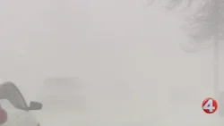 Strong winds pushing snow into roads in Orchard Park