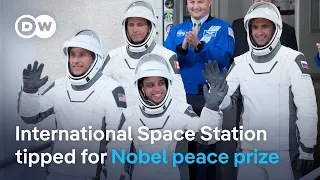 Latest ISS flight arrives with US-Russia-Canada crew | DW News