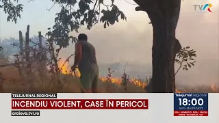 VIOLENT FIRE, HOMES IN DANGER
