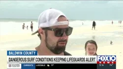 На пляжах округа Болдуин развеваются красные флаги в связи с сохранением опасных условий для серф...