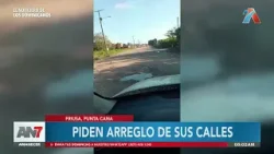 Punta Cana: Vecinos exigen arreglo de calle Alto de Friusa llena de cráteres