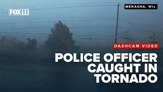 Caught on camera: Tornado moves over police officer's squad vehicle