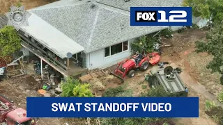 Video shows suspect firing at drone, SWAT pinning tractor during Clackamas County standoff