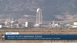 Warning signs going up at Rocky Flats warn of possible radioactive contamination