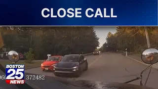 Caught on camera: Tesla blows past stopped school bus, nearly hits student in Mass. town