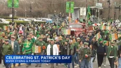 Жители Чикаго, несмотря на холод, приняли участие в окрашивании рек и параде в честь Дня Святого ...