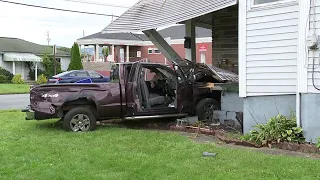 Crews were called to Pittston Avenue after a truck drove into a home