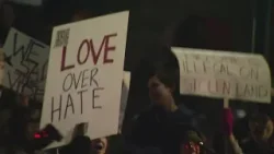 Demonstrators march in Denver in protest of ICE