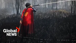 15-year-old "Superman" joins fight against raging Indonesia wildfires