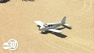 Plane makes emergency landing on sand at Huntington Beach