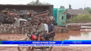 OVERTURNED TRUCK, SPILLED METAL SCRAPS CAUSE GRIDLOCK