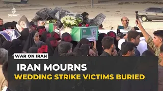 Funerals held in Iran for wedding party victims of US missile strikes