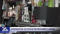 Фонд-дю-Лак на начальном этапе изучения зоны для распития напитков на открытом воздухе в центре г...