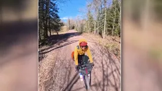 Woman pedals across Michigan to raise domestic violence awareness